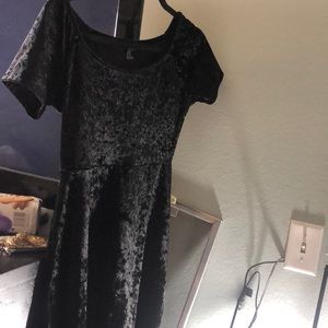 A black velvet skater dress worn twice